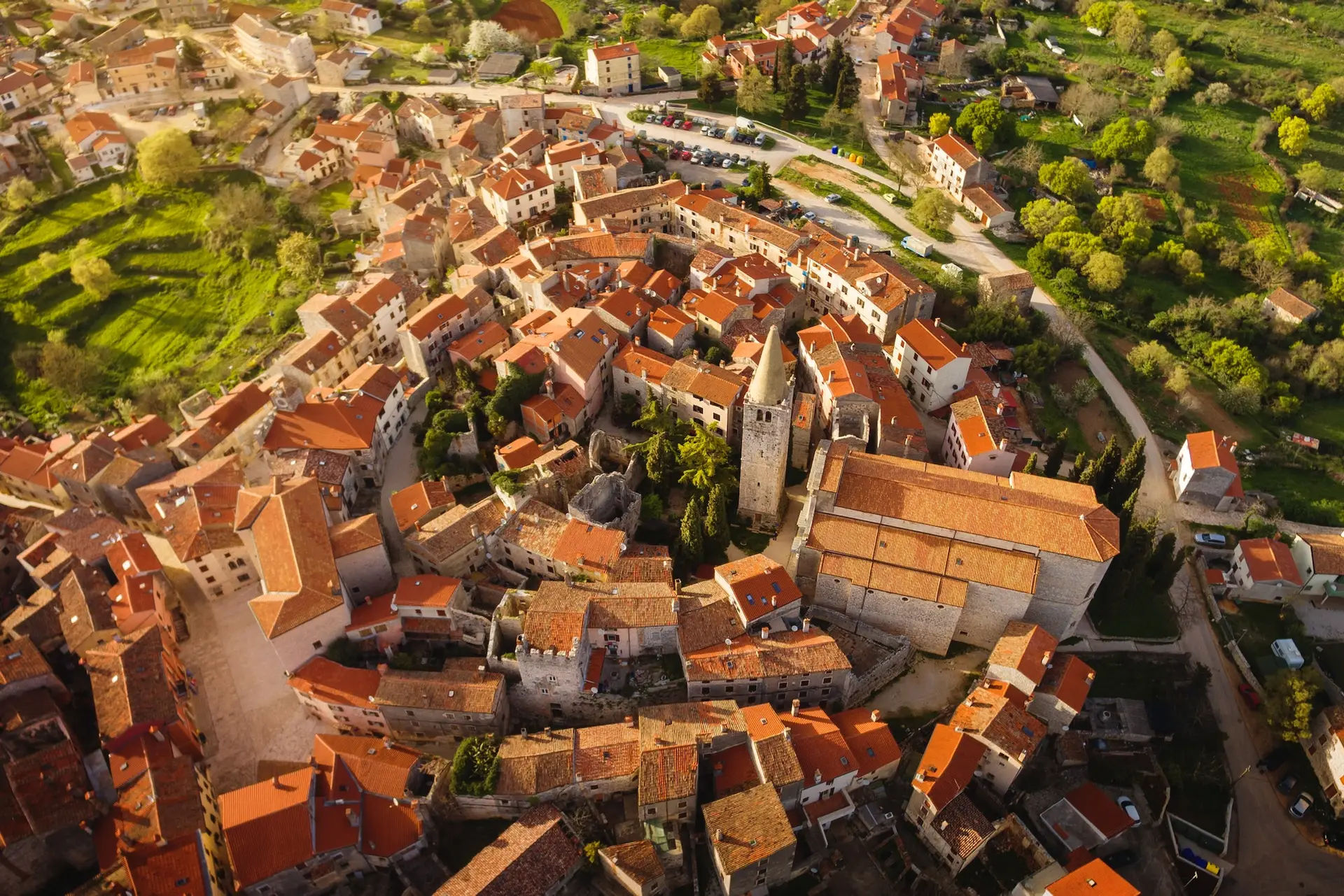 Aerial shot of Bale surrounded by greenery under the sunlight in Croatia