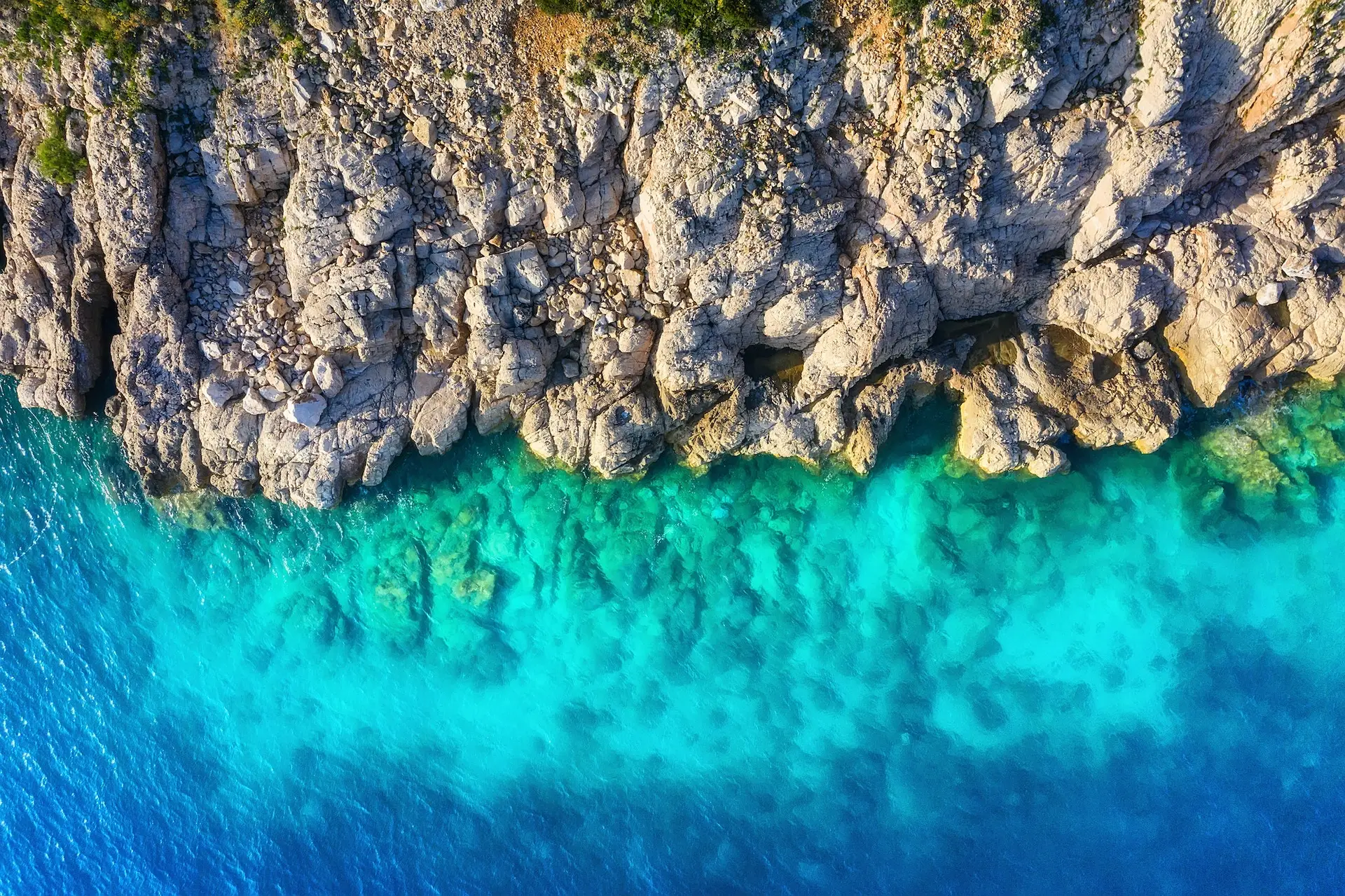 Croatia. Coast as a background from top view. Turquoise water background from top view.